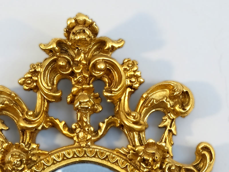 vergoldeter Speigelrahmen mit Krone
